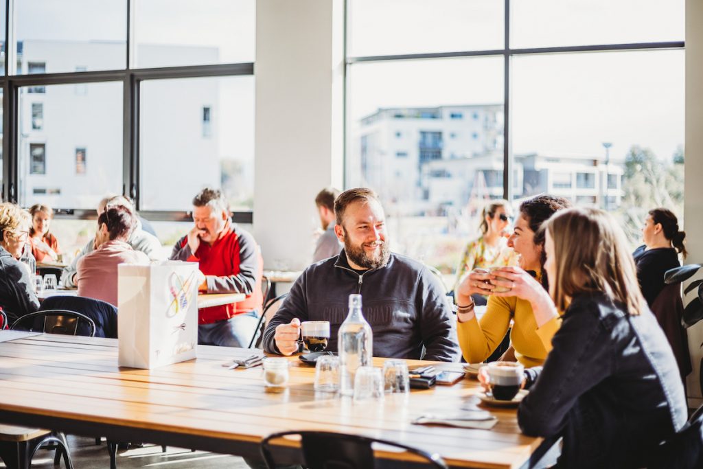 Socialising with friends and family in a Canberra cafe